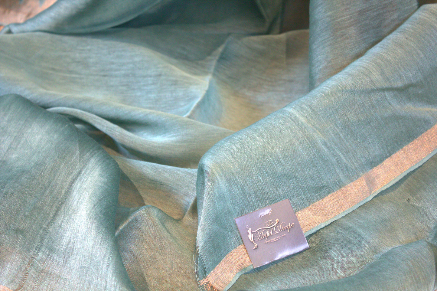 Silk linen Blue saree with birds weaving and plain running blouse