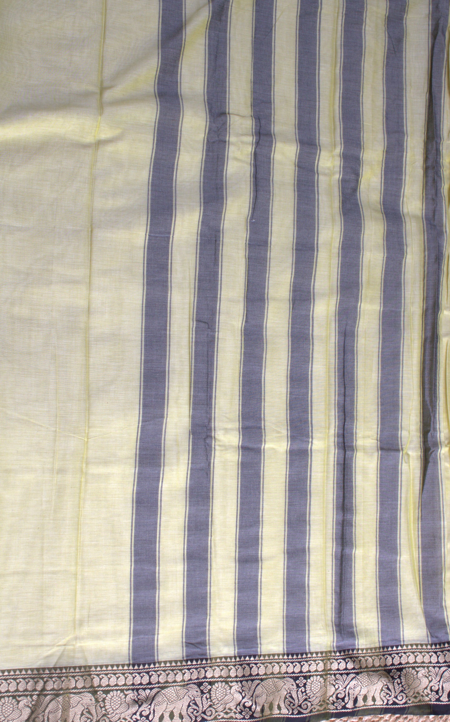 Narayanpet cotton Light Yellow saree with Elephant motifs green border and running blouse