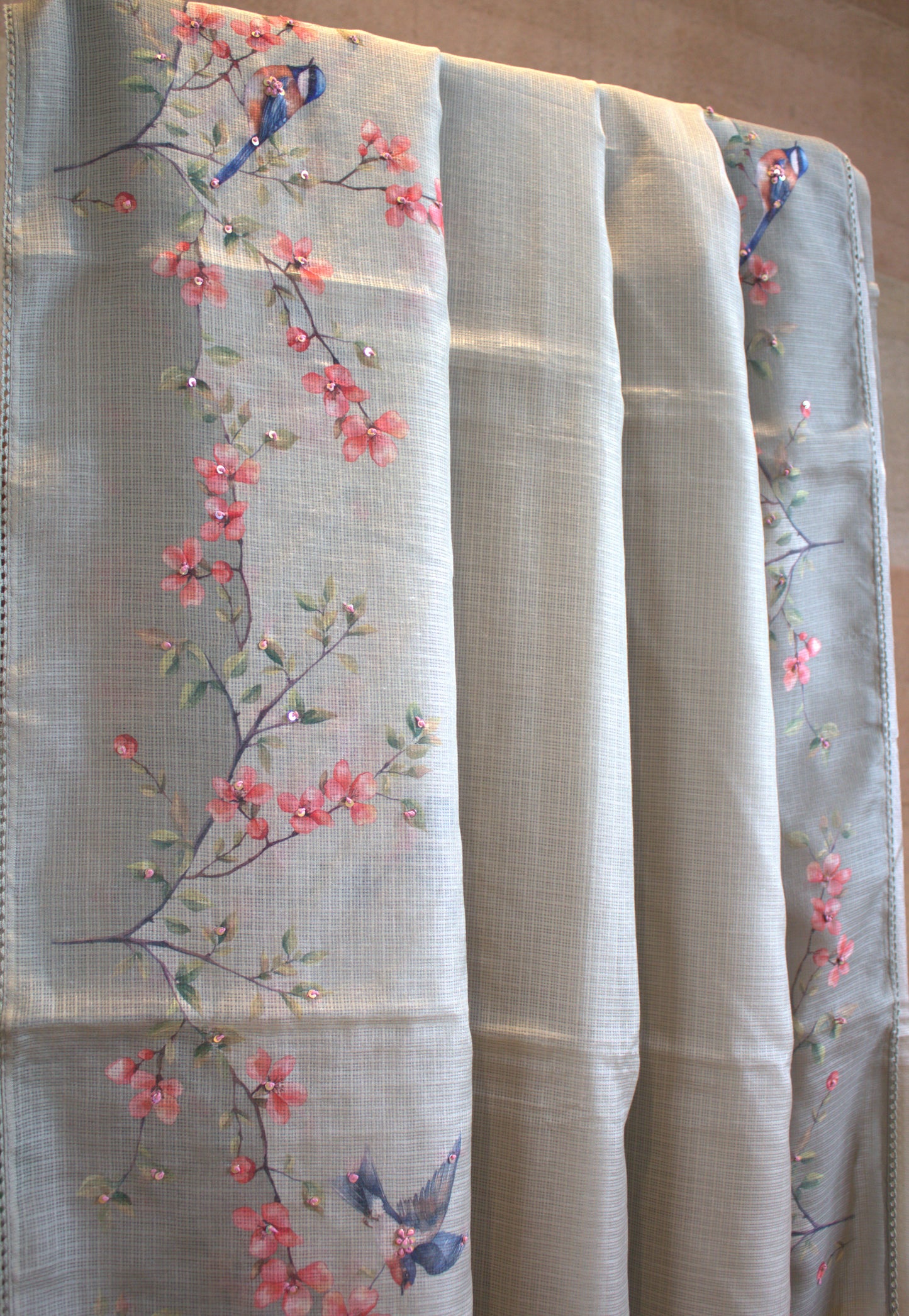 Kota Green saree with Beautiful prints and hand work and printed blouse