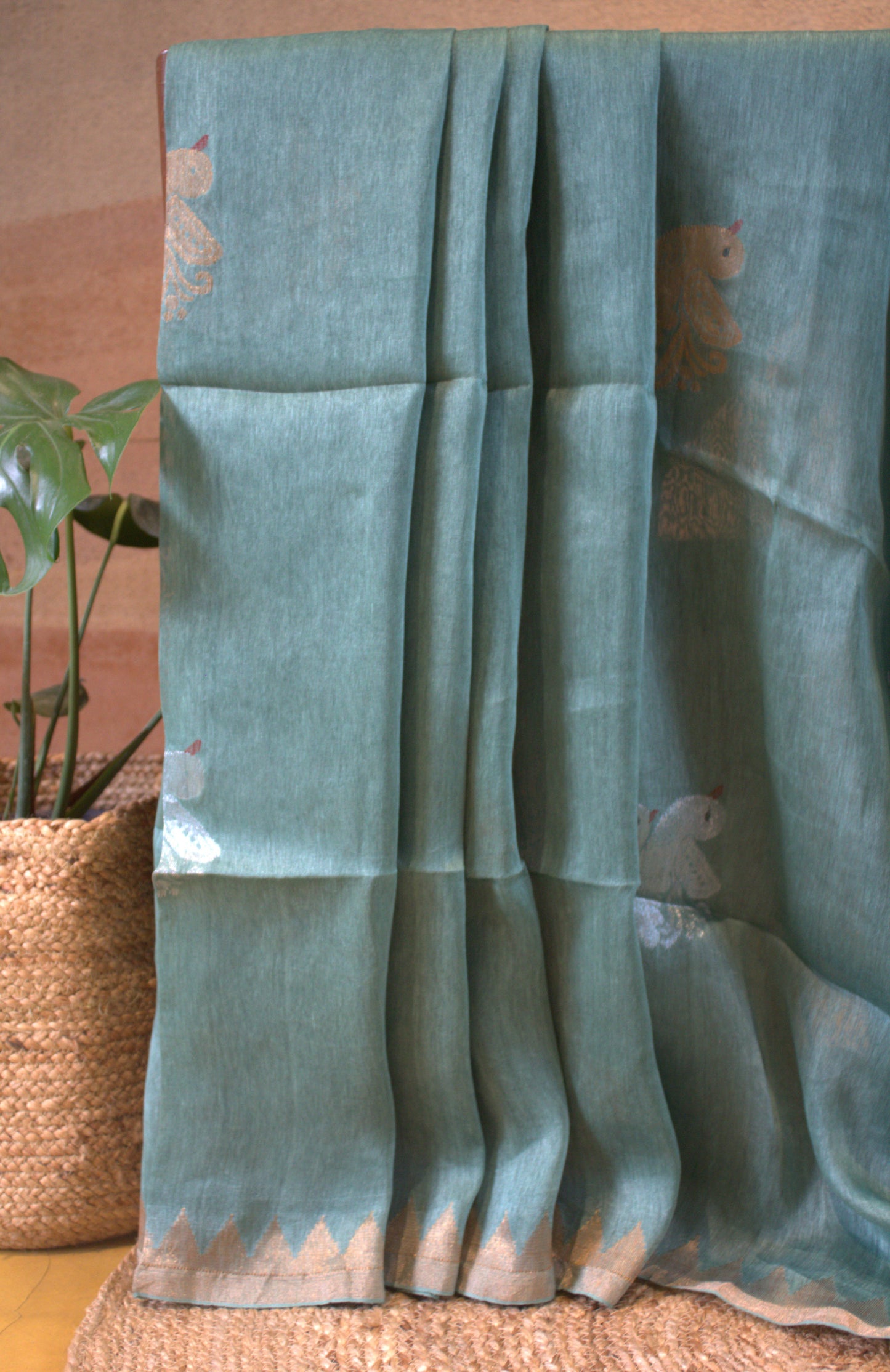 Silk linen Blue saree with birds weaving and plain running blouse