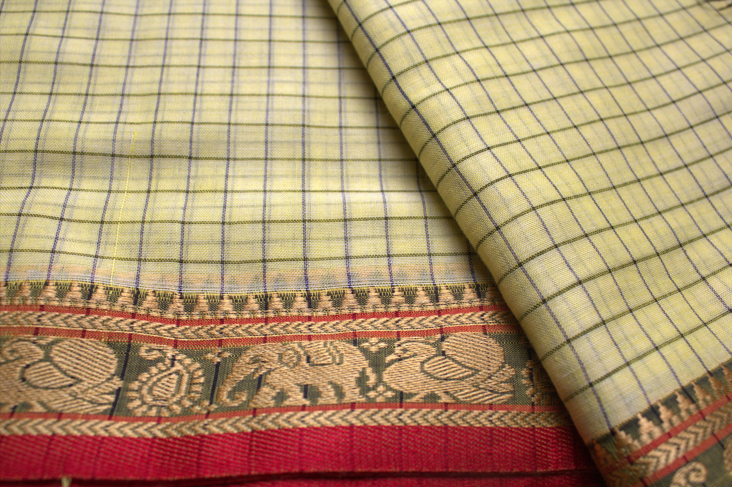 Narayanpet cotton Lemon yellow checks saree with Elephants motifs border and running blouse