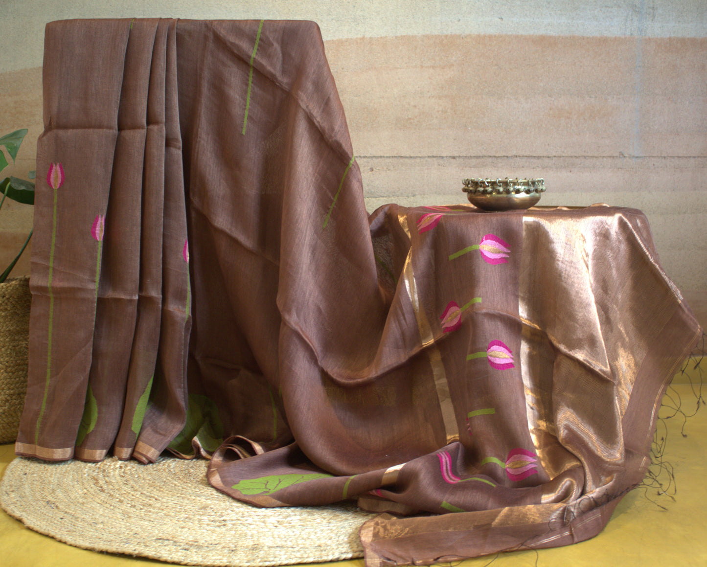 Silk linen onion color saree with lotus weaving and running plain blouse with zari