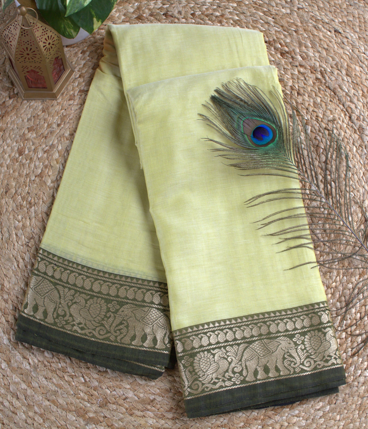 Narayanpet cotton Light Yellow saree with Elephant motifs green border and running blouse