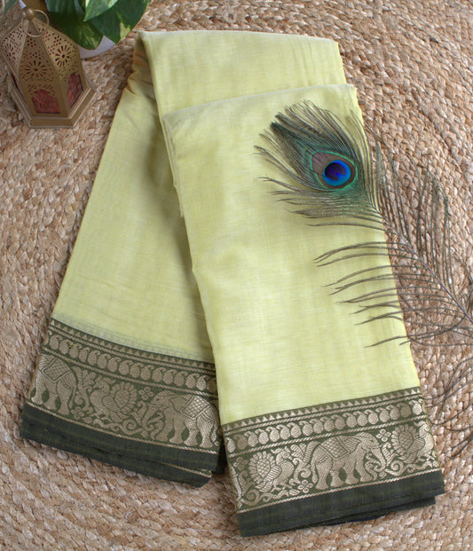 Narayanpet cotton Light Yellow saree with Elephant motifs green border and running blouse