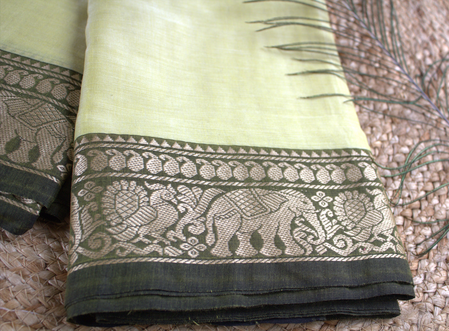 Narayanpet cotton Light Yellow saree with Elephant motifs green border and running blouse
