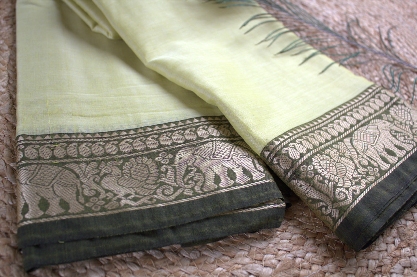 Narayanpet cotton Light Yellow saree with Elephant motifs green border and running blouse