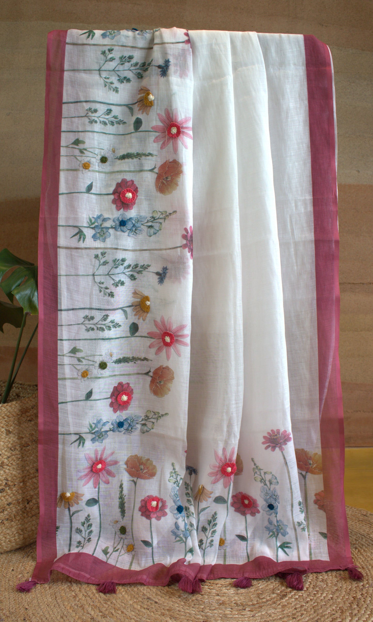 Cotton White saree with hand embroidery and contrast Pink printed blouse