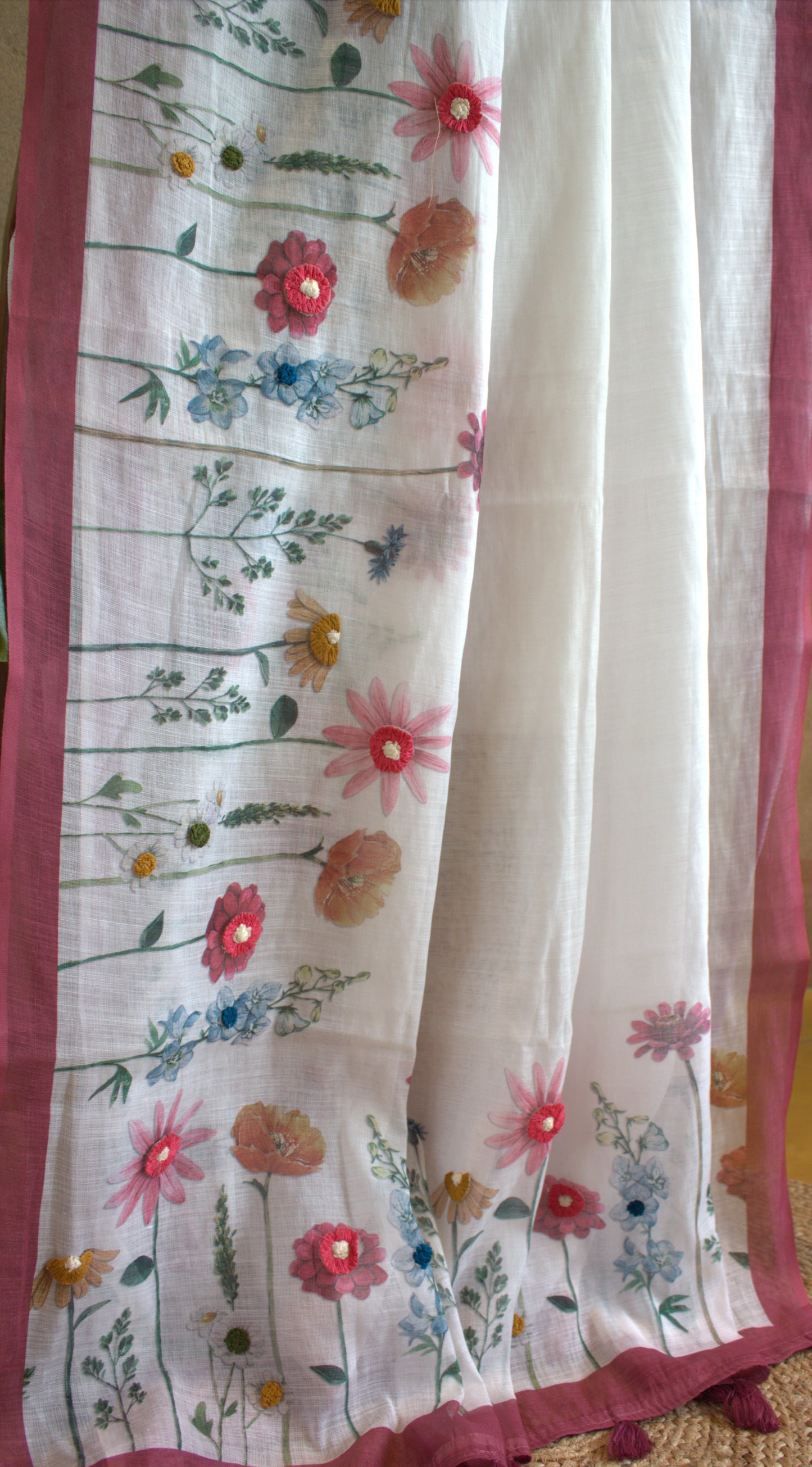 Cotton White saree with hand embroidery and contrast Pink printed blouse